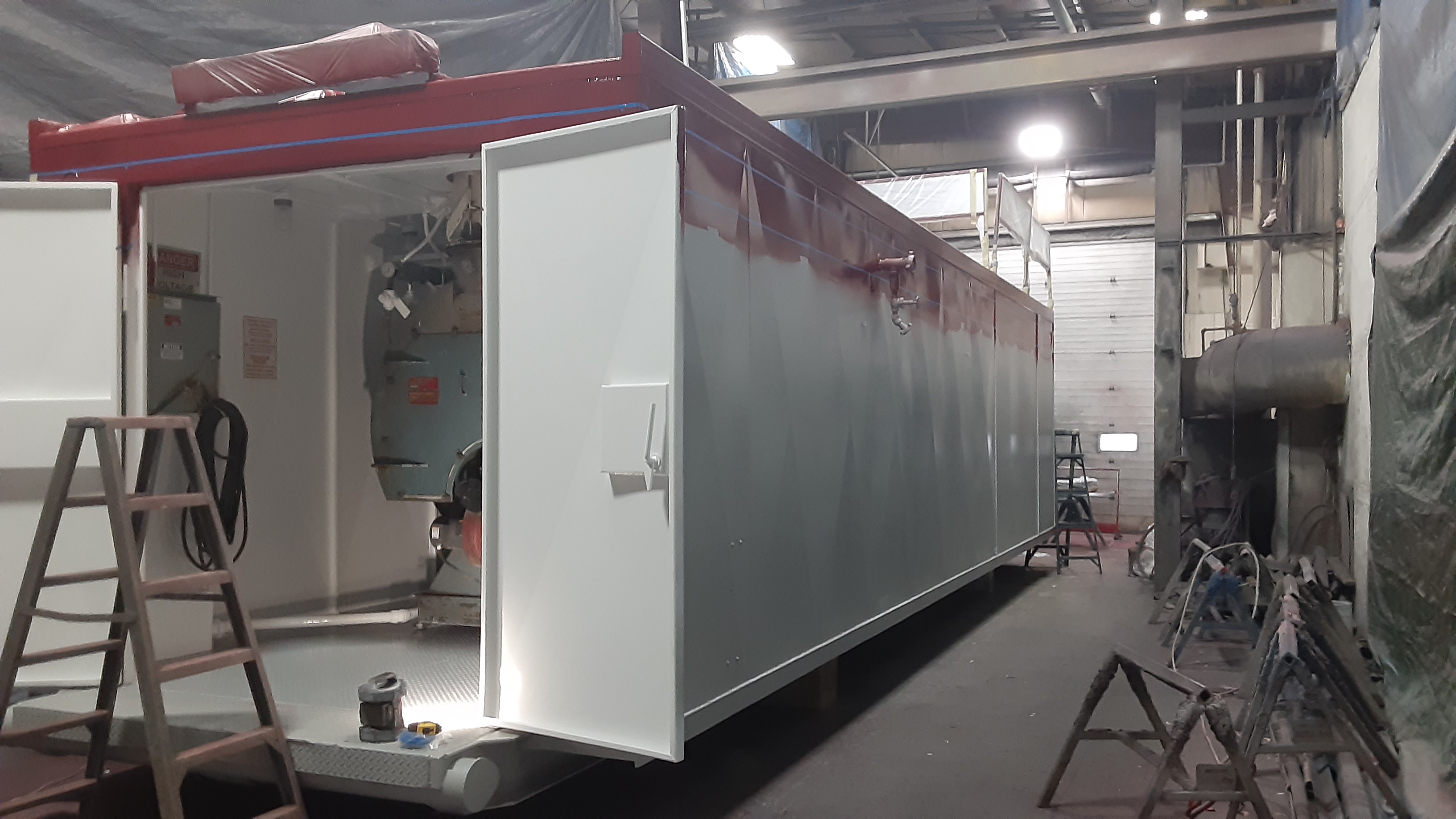 A boiler being prepped for the next coat of paint